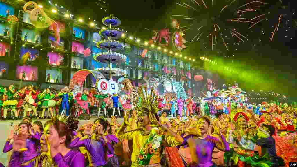 Performers participate in the annual Chinese Lunar New Year Chingay parade in Singapore.