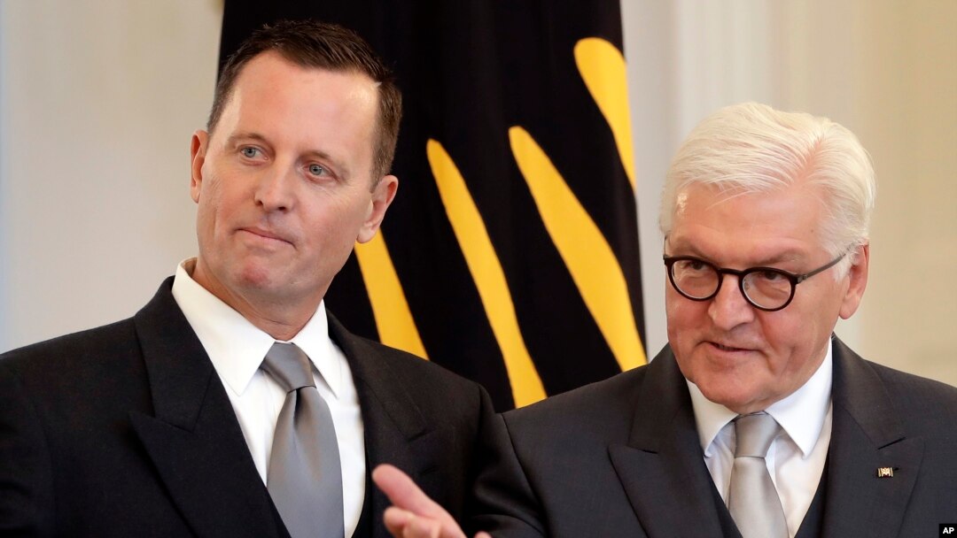 German President Frank-Walter Steinmeier, right, gestures during the accreditation of the U.S. Ambassador in Germany, Richard Grenell, left, at the Belevue palace in Berlin, Germany, May 8, 2018.