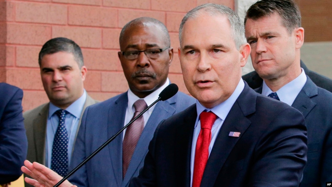 FILE - Environmental Protection Agency Administrator Scott Pruitt speaks at a news conference with Pasquale "Nino" Perrotta (2nd-L) in East Chicago, Ind., April 19, 2017. 