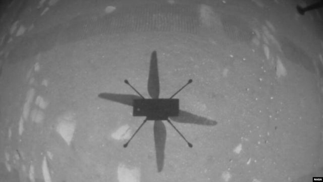 NASA’s Ingenuity Mars Helicopter captured this shot as it hovered over the Martian surface on Apr. 19, 2021, during the first instance of powered, controlled flight on another planet. (NASA/JPL-Caltech)