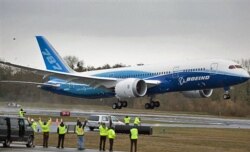FILE - The Boeing 787 Dreamliner jet takes off for its long-waited first flight, 15 Dec 2009, at Paine Field In Everett, Washington.