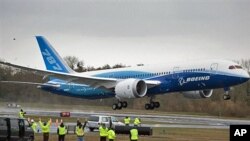 The Boeing 787 Dreamliner jet takes off for its long-waited first flight, 15 Dec 2009, at Paine Field In Everett, Washington
