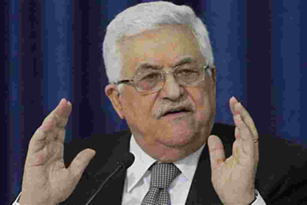 Palestinian President Mahmoud Abbas gestures as he speaks during a press conference with members of the Israeli Peace Initiative in Ramallah, April 28, 2011