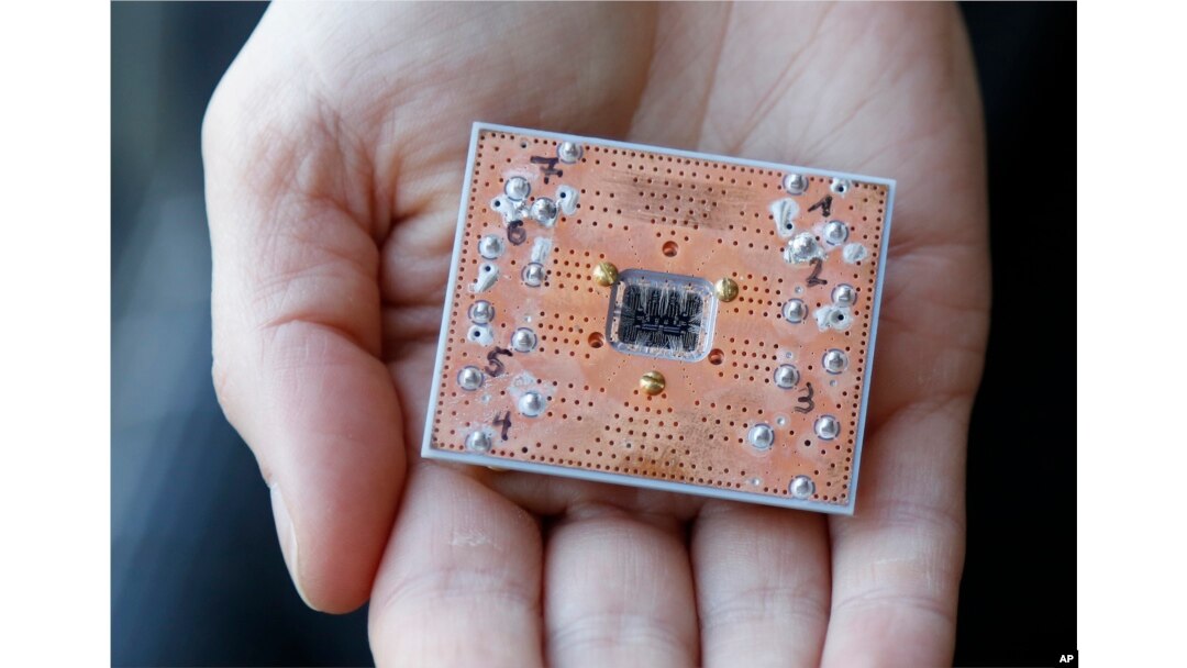 FILE - A seven cubit quantum device is seen at the IBM Thomas J. Watson Research Center in Yorktown Heights, N.Y., Feb. 27, 2018.