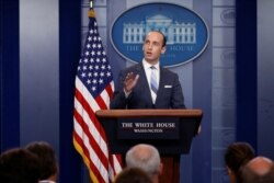 FILE - White House senior policy adviser Stephen Miller discusses U.S. immigration policy at the daily press briefing at the White House in Washington, Aug. 2, 2017.