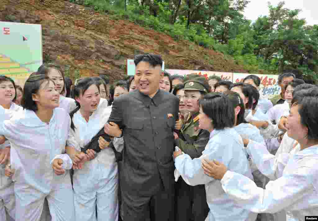 North Korean leader Kim Jong-un visits a mushroom farm in this undated photo released by North Korea&#39;s Korean Central News Agency (KCNA) in Pyongyang. 