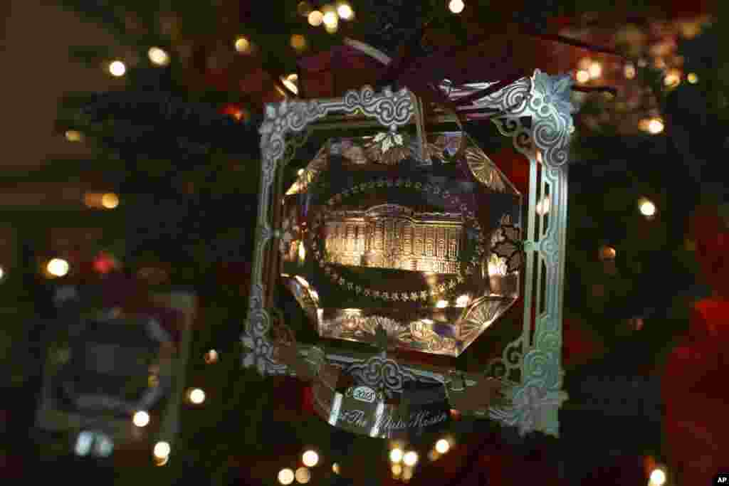 First Family's official Christmas ornament is seen during the 2018 Christmas Press Preview at the White House in Washington, Monday, Nov. 26, 2018. (AP Photo/Carolyn Kaster)