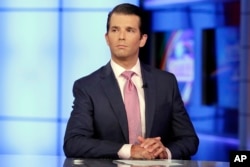 FILE - In this July 11, 2017, photo, Donald Trump Jr. is interviewed by host Sean Hannity on Fox News Channel.