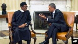 President Barack Obama, right, meets with Nigerian President Muhammadu Buhari, in the Oval Office of the White House, on Monday, July 20, 2015, in Washington. Buhari is seeking to shore up relations between the two countries and to request additional assi