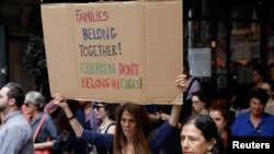 People protest against the Trump administration policy of separating immigrant families suspected of illegal entry, in New York, June 20, 2018.