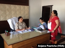 Inspector Umesh Bala gives instructions to her staff at the Women Police Station in Gurgaon, Haryana.