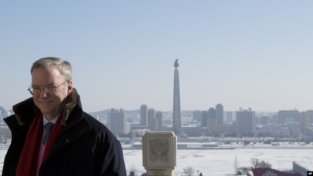 Executive Chairman of Google Eric Schmidt stands on a balcony at the Grand Peoples Study House overlooking Juche Tower in Pyongyang, North Korea, January 9, 2013.