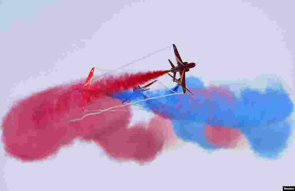 The Red Arrows, the British Royal Air Force Aerobatic Team, perform at the Malta International Airshow 2013 at Malta International Airport, outside Valletta, Malta, Sept. 29, 2013.