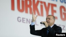 Turkish President Recep Tayyip Erdogan makes a speech during a meeting of his ruling AK Party in Ankara, Turkey, May 11, 2018. 