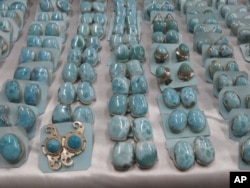 Earrings made with larimar gemstone are on display at a gift shop in Santo Domingo, Dominican Republic, March 12, 2015.