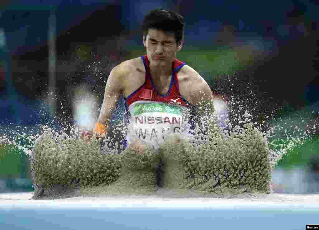 Wang Hao of China competes in the men&#39;s long jump - T47 Final at the Olympic Statium in Rio de Janeiro, Brazil, during the 2016 Rio Paralympics.