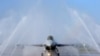 FILE - A U.S.-made F-16V fighter jet is cleaned by an auto washing machine during a military exercise in Chiayi County, southern Taiwan, Jan. 15, 2020. 