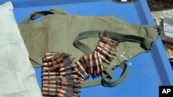 In Mogadishu, AU forces display ammunition left behind by militants.