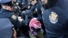 A demonstrator is detained by police officers during a protest following the arrest by U.S. immigration agents of Palestinian student protester Mahmoud Khalil at Columbia University in New York City, March 10, 2025. 