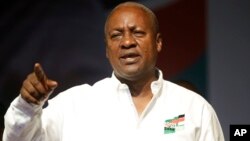 Ghana Incumbent President, John Dramani Mahama candidate of the National Democratic Congress gesture to his supporters during a presidential election rally at Accra Sports Stadium in Accra, Ghana, Monday, Dec. 5, 2016. The Ghana election will take place o