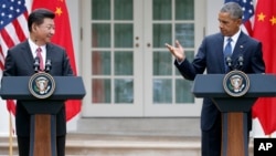 Tổng thống Mỹ Barack Obama và Chủ tịch nước Trung Quốc Tập Cận Bình trong cuộc họp báo chung tại Vườn Hồng Tòa Bạch Ốc, ngày 25/9/2015.