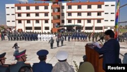 Bolivia's President Evo Morales (R) speaks during the inauguration of the military school which Bolivia's government said would teach an "anti-imperialist" doctrine in Warnes near Santa Cruz, Bolivia, Aug. 17, 2016. (Courtesy of Bolivian Presidency/Handout)