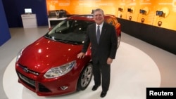Dave Schoch, chairman and CEO of Ford Greater China, poses in Ford's booth in Taipei, June 4, 2012.
