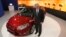 Dave Schoch, chairman and CEO of Ford Greater China, poses in Ford's booth in Taipei, June 4, 2012.