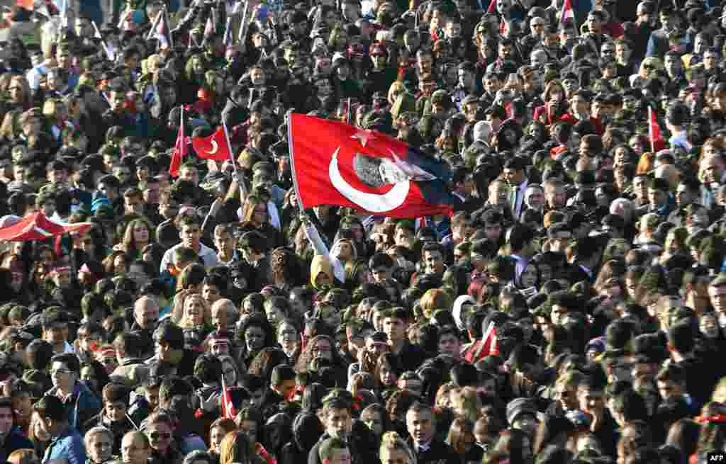 People attend a ceremony at the mausoleum of Mustafa Kemal Ataturk, the Turkish Republic&rsquo;s founder, marking the anniversary of his death in Ankara.