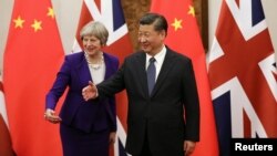 中国国家主席习近平和英国首相特蕾莎·梅在钓鱼台国宾馆(2018年2月1日路透社)