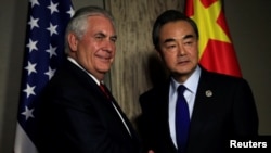 عکس آرشیوی از دیدار رکس تیلرسون وزیر خارجه آمریکا با وانگ یی وزیر خارجه چین - ۶ اوت ۲۰۱۷ 