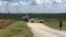 Police cars block access to the site where a hot air balloon crashed near Lockhart, Texas, July 30, 2016. At least 16 people were on board the balloon, which a Federal Aviation Administration spokesman said caught fire before crashing into a pasture.