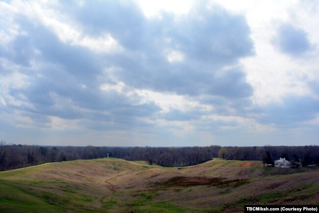 This photograph taken at Vicksburg National Military Park shows the “no man’s land” area between Confederate and Union Lines. The white column in the far distance is one of many state monuments that honor the fallen soldiers from that state.