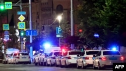 Police cars are parked in a street in the city of Rostov-on-Don, early on June 24, 2023.