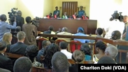 Reporters were allowed in to the packed courtroom in the morning when the treason trial of four South Sudan political detainees began on March 11, 2014, but not in the afternoon.