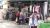 En Navidad, venezolanos de bajos ingresos recurren a ventas de garaje