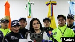 Aida Merlano, excongresista colombiana condenada por compra de votos y fuga de la justicia, reacciona durante la revisión de identificación en la Dirección de Investigación Criminal (DIJIN) luego de llegar a su país, en Bogotá, Colombia, 10 de marzo de 2023.