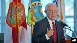 U.S. Attorney General Jeff Sessions gestures as he speaks during a news conference in Miami, Florida, Aug. 16, 2017. As the White House wages a fight with cities and states over how far they should cooperate with federal immigration authorities, Sessions visited Miami to hail it as an example of a city that reversed its sanctuary policies to follow President Donald Trump's orders.