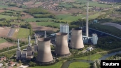 FILE - The four natural-gas power plants 'Gersteinwerk' of Germany's RWE Power, one of Europe's biggest electricity and gas companies near the North Rhine-Westphalian town of Hamm, Germany, May 6, 2015.