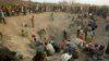 FILE - Miners digging for diamonds in Marange, eastern Zimbabwe, Nov. 1, 2006.