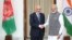 Afghan President Ashraf Ghani, left, and Indian Prime Minister Narendra Modi shake hands before the start of their official meeting in New Delhi, Oct. 24, 2017.