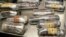 FILE - This photo provided by U.S. Customs and Border Protection shows packages of methamphetamine and heroin found in a car at the U.S.-Mexico border port of entry in Nogales, Ariz. Border Patrol agents seized more than $1 million in heroin Friday in New