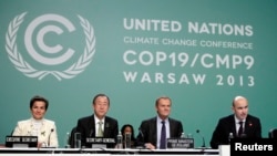 Officials at the COP19 conference at the National Stadium in Warsaw, Nov. 19, 2013.