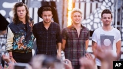 FILE - One Direction members, from left, Harry Styles, Liam Payne, Niall Horan and Louis Tomlinson perform on ABC's "Good Morning America," Aug. 4, 2015.