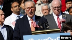 FILE - Senate Minority Leader Chuck Schumer speaks at an event marking the seventh anniversary of the passing of the Affordable Care Act outside the Capitol Building in Washington, March 22, 2017. 