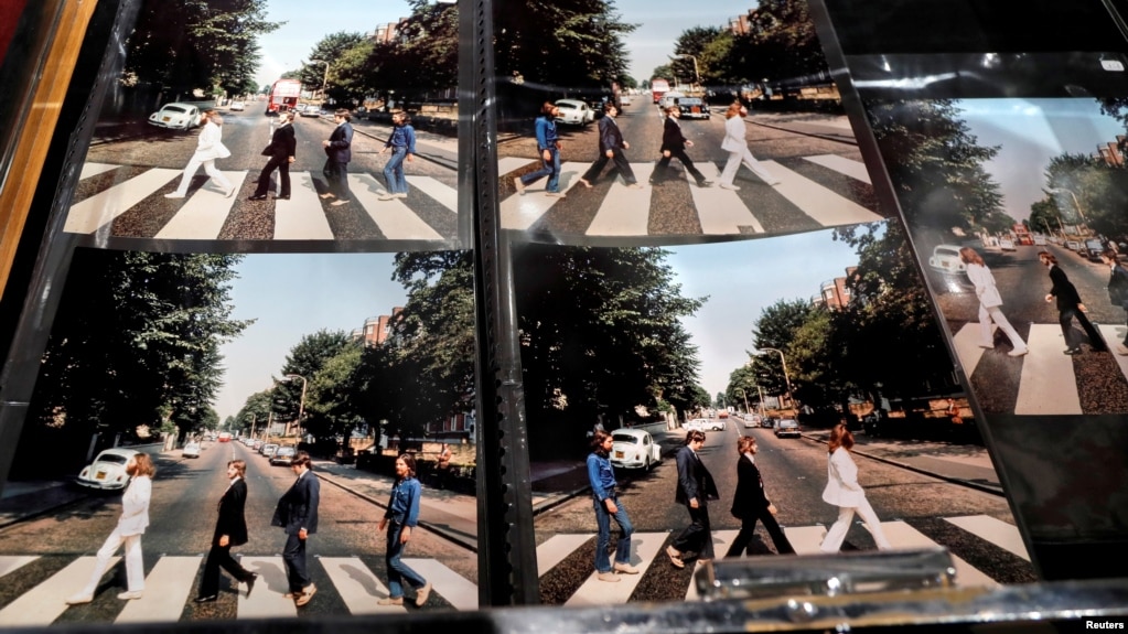 Five alternate pictures for the cover of Abbey Road are displayed by French Beatles specialist and collector Jacques Volcouve, one of the world's greatest living experts of the band, at Drouot auction house in Paris, March 16, 2017.