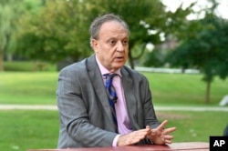 Bishara Bahbah, national chairman for Arab Americans for Trump, answers questions during an interview on Aug. 14, 2024, in Dearborn, Michigan.