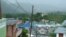 FILE - Houses from a seaside neighborhood are seen as Tropical Storm Karen approaches in Naguabo, Puerto Rico, Sept. 24, 2019.