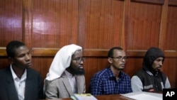 From left to right: defendants Rashid Charles Mberesero, Sahal Diriye Hussein, Hassan Aden Hassan and Mohamed Abdi Abikar, sit in the dock to hear their verdict at a court in Nairobi, Kenya, June 19, 2019.