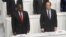 法国总统奥朗德和刚果民主共和国总统卡比拉在法语国家峰会开幕式上起立
